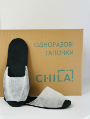 Тапочки одноразовые "Эконом" черно-белые (100 пар)